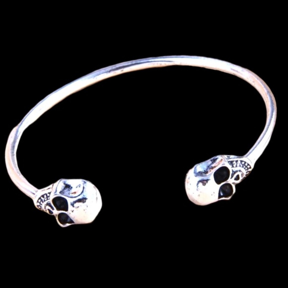 Skull design bracelet silver toned black accents